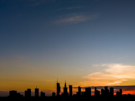 Panorama of the city, the panorama of Warsaw with a beautiful sunsetの写真素材