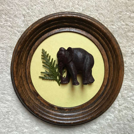 Framed Collage with an Elephant and Coniferous Tree