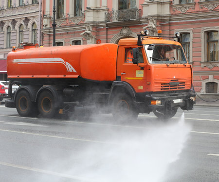 Road cleaning and disinfection with special equipment, Nevsky Prospekt 41, Saint Petersburg, Russia July 2020のeditorial素材