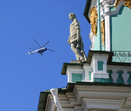 Tourist helicopter in the sky over the Winter Palace, Palace square, Saint Petersburg, Russia, august2020のeditorial素材
