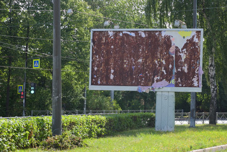 Old empty rusty billboard on the street, ulitsa Sedova, St. Petersburg, Russia, August 2021のeditorial素材