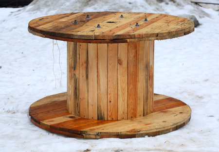 Wooden cable rail in the snowの写真素材