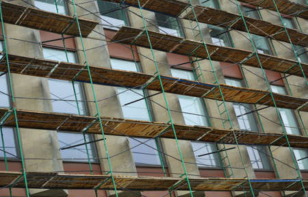 Scaffolding on the wall of the houseの写真素材