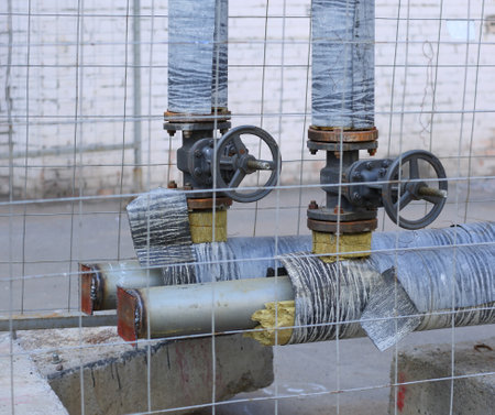 Two valves on the outer metal pipes