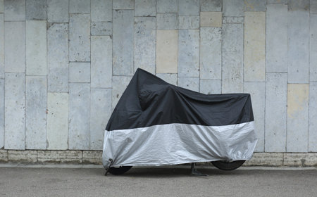 The motorcycle is covered with a coverの写真素材