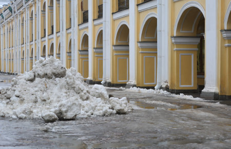 A pile of snow on the city streetの写真素材