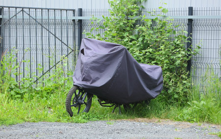 The motorcycle is covered with a coverの写真素材