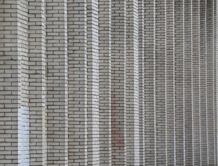 Ribbed wall with white brick projections
