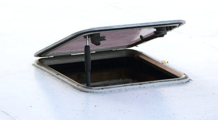 Square ventilation hatch in the white roof