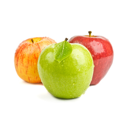 closeup beautiful fresh apples isolated on whiteの写真素材