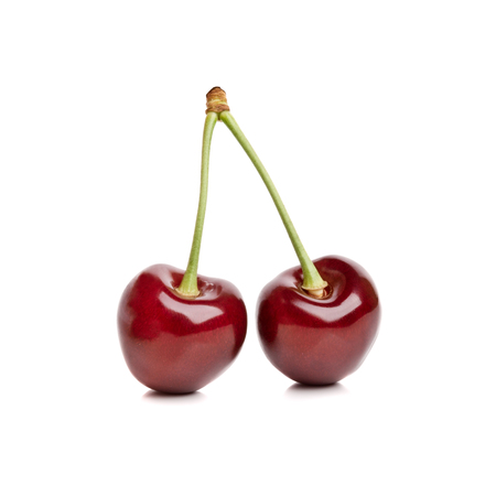 closeup fresh cherry isolated on whiteの写真素材