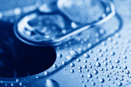 close-up pull tab of tin with condensation