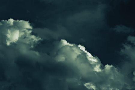 abstract mysterious nightly cloudscape backgroundの写真素材