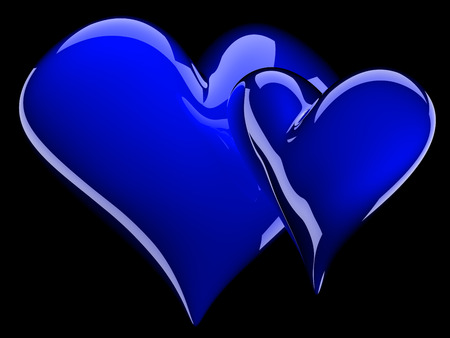 two glossy blue hearts isolated on blackの写真素材
