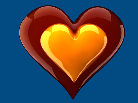 beautiful glossy yellow heart inside glass heartの写真素材