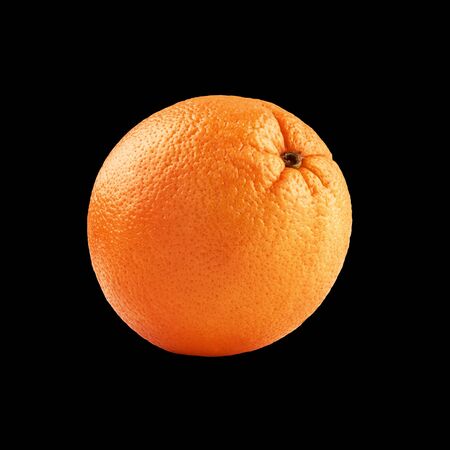 Photo of closeup isolated juicy fruit orange isolated on black backgroundの写真素材