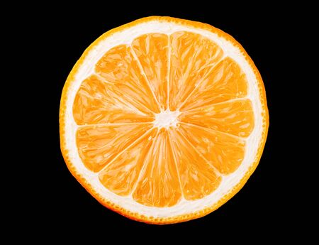 Macro photo of slice of orange fruit isolated on black backgroundの写真素材