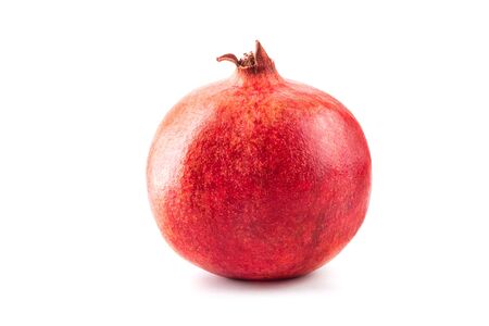 Macro photo of close up pomegranate isolated on white backgroundの写真素材