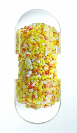 Close-up open capsule or pill antibioic painkiller with many spheres medicine inside. Health medical concept. 3d renderの写真素材