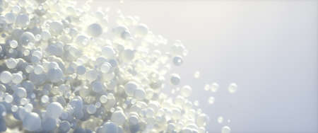 Abstract background of 3d spheres. Modern plastic pastel bubbles. Concept of science physics nano rendering glossy ballsの写真素材