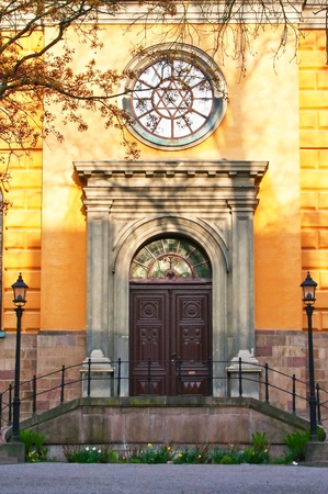 Ramp, door and window of the church with lanterns ps on both sides, Stockholm, Swedenの写真素材