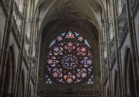 PRAGUE, CZECH REP. - MAY 04, 2015: A huge stained glass window over the entrance to the Cathedral of St. Vitus on May 4, 2015. Prague. Czech Republicのeditorial素材
