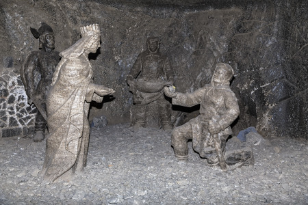 WIELICZKA, POLAND - OCTOBER 23, 2015: Sculpture in a salt mine - an offering of salt to the queen. Wieliczka. Polandのeditorial素材