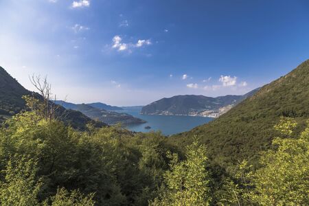 The mountains of Lombardy, Lake Iseo and a small island in it. Italyの写真素材