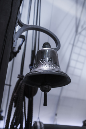 OSLO, NORWAY - MAY 07, 2013: The ship's bell on an old icebreaker in the same Fram Museum in Oslo. Norway.のeditorial素材