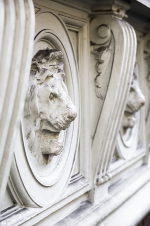 Stucco on the wall of the building in the form of a lion's head. Veszprem. Hungaryの写真素材