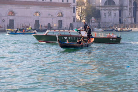 Italy, Venice-November 02, 2014: Heavy traffic of various motor boats and gondolas along the Grand canal in Venice. Italyのeditorial素材
