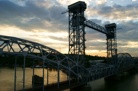 Railway bridge over the River Don at sunset の写真素材