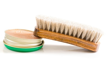 shoe polish and brush isolated on a whiteの写真素材