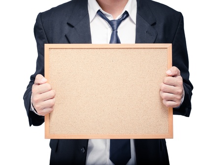 Business man holding cork board on the backgroundの写真素材