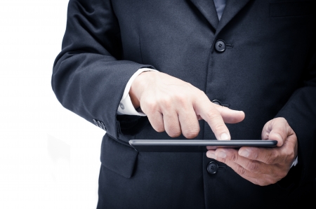 Business man working with a digital tablet isolate on white backgroundの写真素材