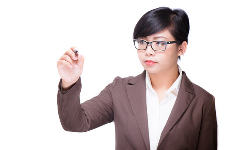 Young businesswoman drawing something, copyspace for the designerの写真素材