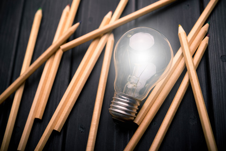 Light bulb with many pencils