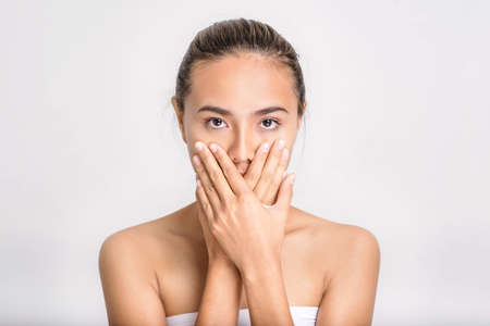 Woman with beautiful face on white background