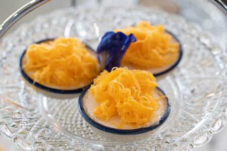 Steamed banana cake with Golden threadsの写真素材