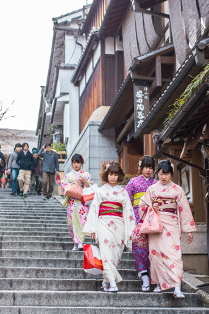 Kyoto, Japan - February 25, 2014 - Fake geishas in Sannen Zaka street at sunset in Kyoto, Japanのeditorial素材