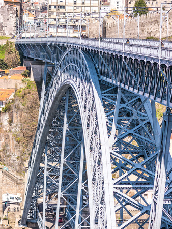 PORTO, PORTUGAL - MARCH 16, 2015: The Douro river runs along Porto ribeira, crossing the Luis I bridge.のeditorial素材
