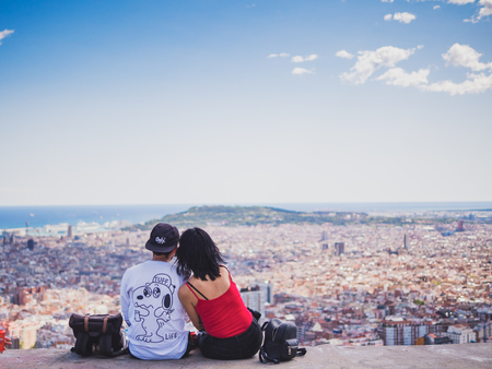 Barcelona, Spain - September 10, 2017: View of a couple watching the city of Barcelona from the Carmel's bunkersのeditorial素材
