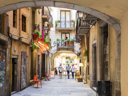 Barcelona, Spain - May 21, 2017: View of a small street in the old Born neighborhood with the tourists walkingのeditorial素材