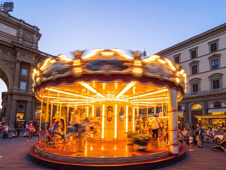 Firenze, Italy - May 27, 2017 - Tourists in the Antica Giostra Toscana carousel in the Piazza della Repubblicaのeditorial素材