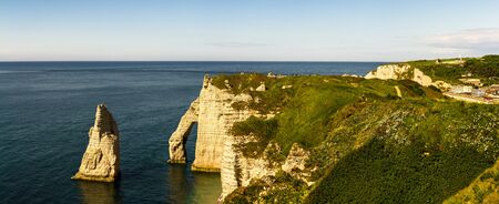 Cliff Seashore with interesting rock formations, destination for tourists that are looking for leisure in beautiful surroundings. France, Normandy, Etretat.の写真素材