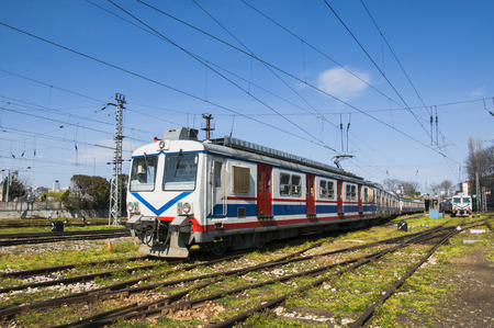 Passenger train approaching the stationの写真素材