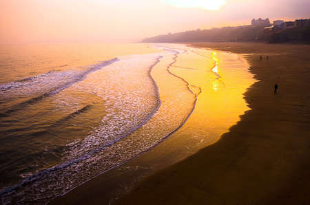 Sunset over Whitby beachの写真素材