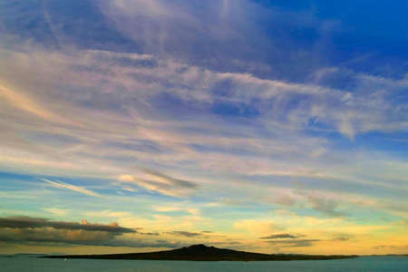 Rangitoto Island in Auckland under dramatic sky.の写真素材