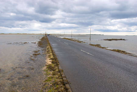 Lindisfarne causeway minutes before being submergedの写真素材