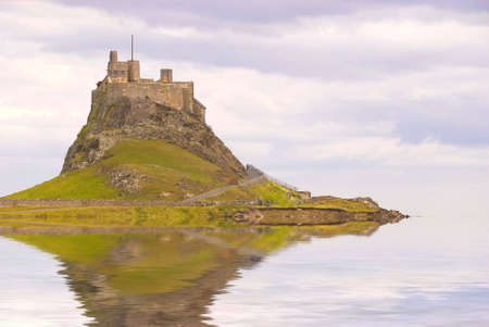 Lindisfarne Castle in Holy Island harbourの写真素材